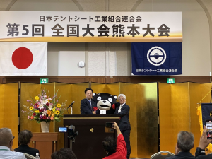 義援金を受け取る木村知事